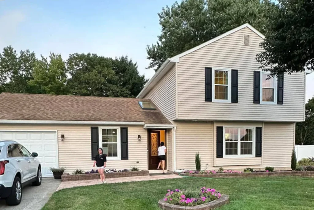 Two-story beige home with new siding and second-floor addition completed by a General Contractor in Williamstown, NJ