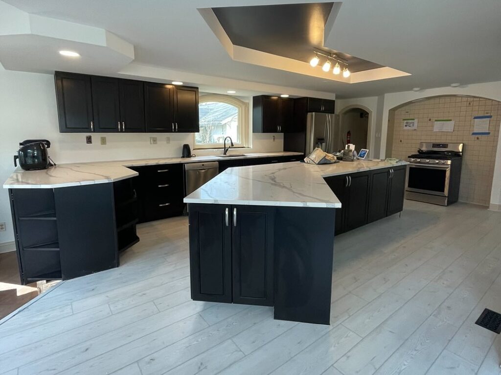 "Farmhouse kitchen renovation in Philadelphia with rustic cabinetry, farmhouse sink, and charming details"