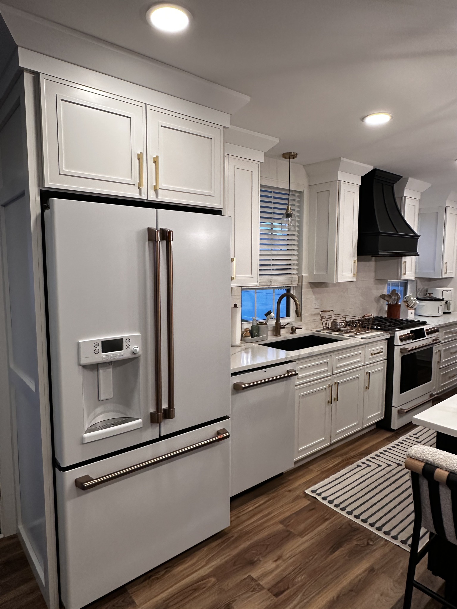 "Philadelphia kitchen renovation with custom cabinetry, modern countertops, and updated appliances"
