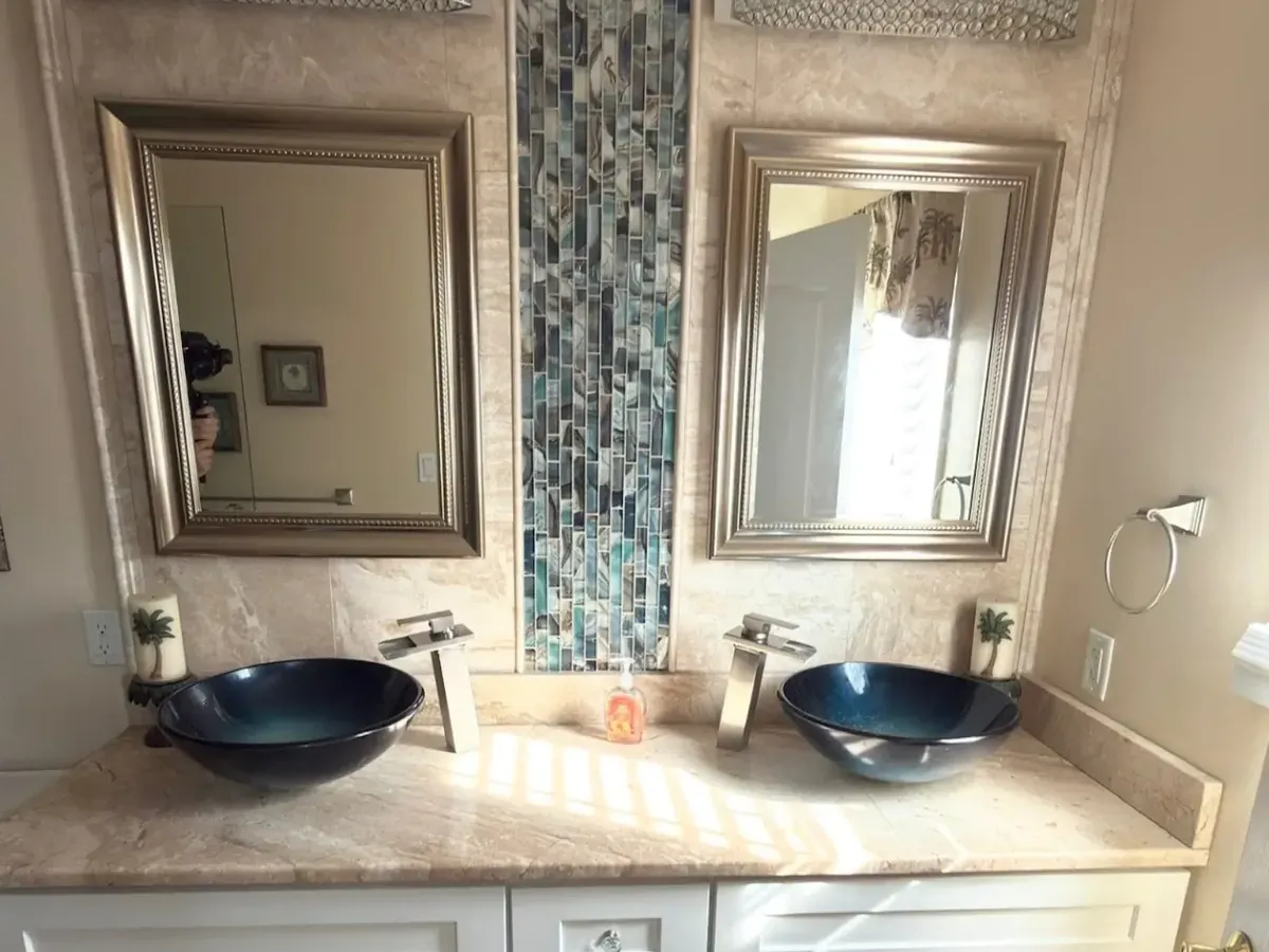 Vessel sink vanity with a vertical tile accent strip in Bridesburg, Philadelphia