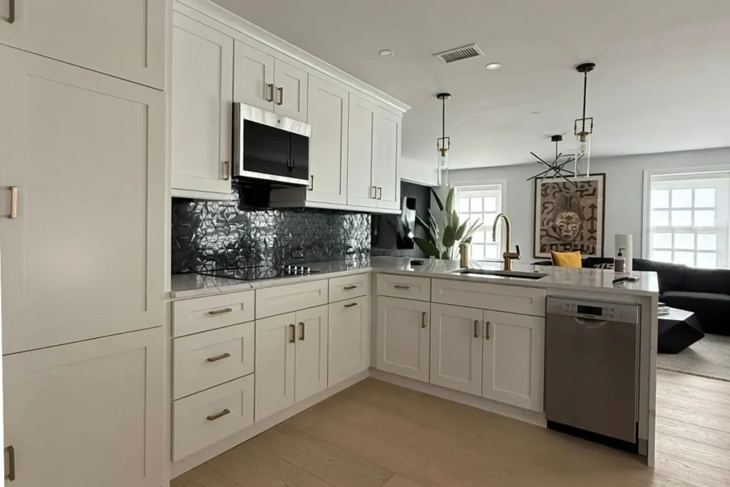White Shaker cabinet kitchen with brass hardware